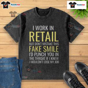 Funny I Work In Retail t-shirt featuring a sarcastic message about fake smiles and frustration in customer service.