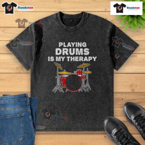 Funny drummer playing drums with a big smile, wearing a 'Drumming is My Therapy' washed t-shirt.
