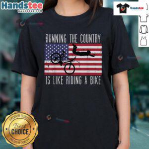 Alt Text: Funny running T-shirt saying Running the Country is Like Riding a Bike for ladies, perfect for political humor lovers.