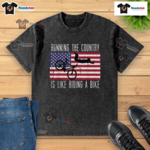 Alt Text: Funny running t-shirt design featuring the quote 'Running the country is like riding a bike' for political humor.