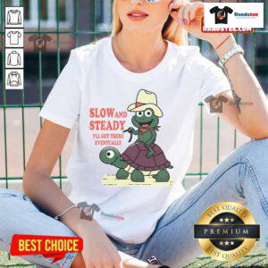 Alt Text: Funny slow and steady cowboy turtle and frog design on a ladies tee, perfect for casual and humorous outfits.