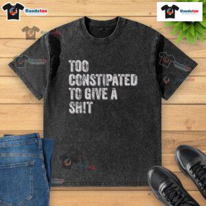 Funny 'Too Constipated to Give a Shit' washed t-shirt design featuring humorous text and playful graphics.