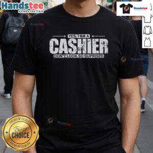 Alt Text: Funny 'Yes I Am A Cashier Don't Look So Surprised' T-Shirt showcasing humor for cashiers in a vibrant design.