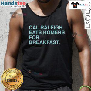 Alt Text: Good Cal Raleigh Eats: Enjoying breakfast in a stylish Homers tank top at a cozy caf.