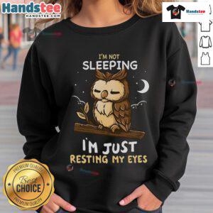 Cozy 'Good I'm Not Sleeping, I'm Just Resting My Eyes' sweatshirt in a soft fabric, perfect for lounging or casual wear.