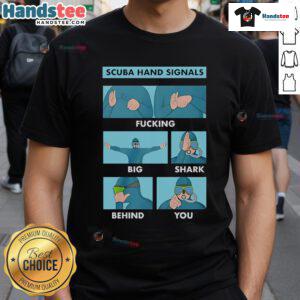 Good Scuba Hand Signals T-Shirt featuring a graphic of a big shark behind a diver, perfect for ocean enthusiasts.