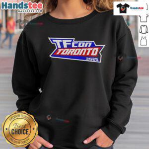 Good TFcon Toronto 2025 Sweatshirt featuring vibrant design and logo, perfect for fans attending the convention.