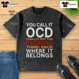 Good You Call It OCD I Call It Put It Back Where It Belongs washed t-shirt design featuring playful text and graphics.