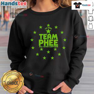 Alt Text: Napheesa Collier wearing a Team Phee All-Star Captain 2025 sweatshirt, smiling happily at the Indy event.