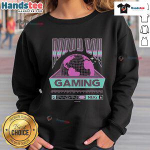 Happy boy wearing a 'Happy Nappy Boy Gaming Worldwide' sweatshirt, smiling while playing video games.