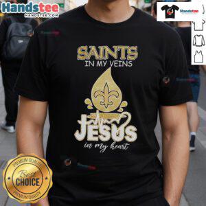 Alt Text: Happy Saints In My Veins Jesus In My Heart T-Shirt featuring a vibrant design with religious symbols and heartfelt messages.