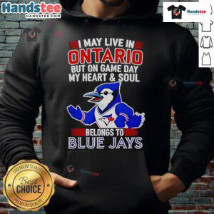 Person wearing a Toronto Blue Jays hoodie, expressing loyalty on game day, despite living in Ontario.
