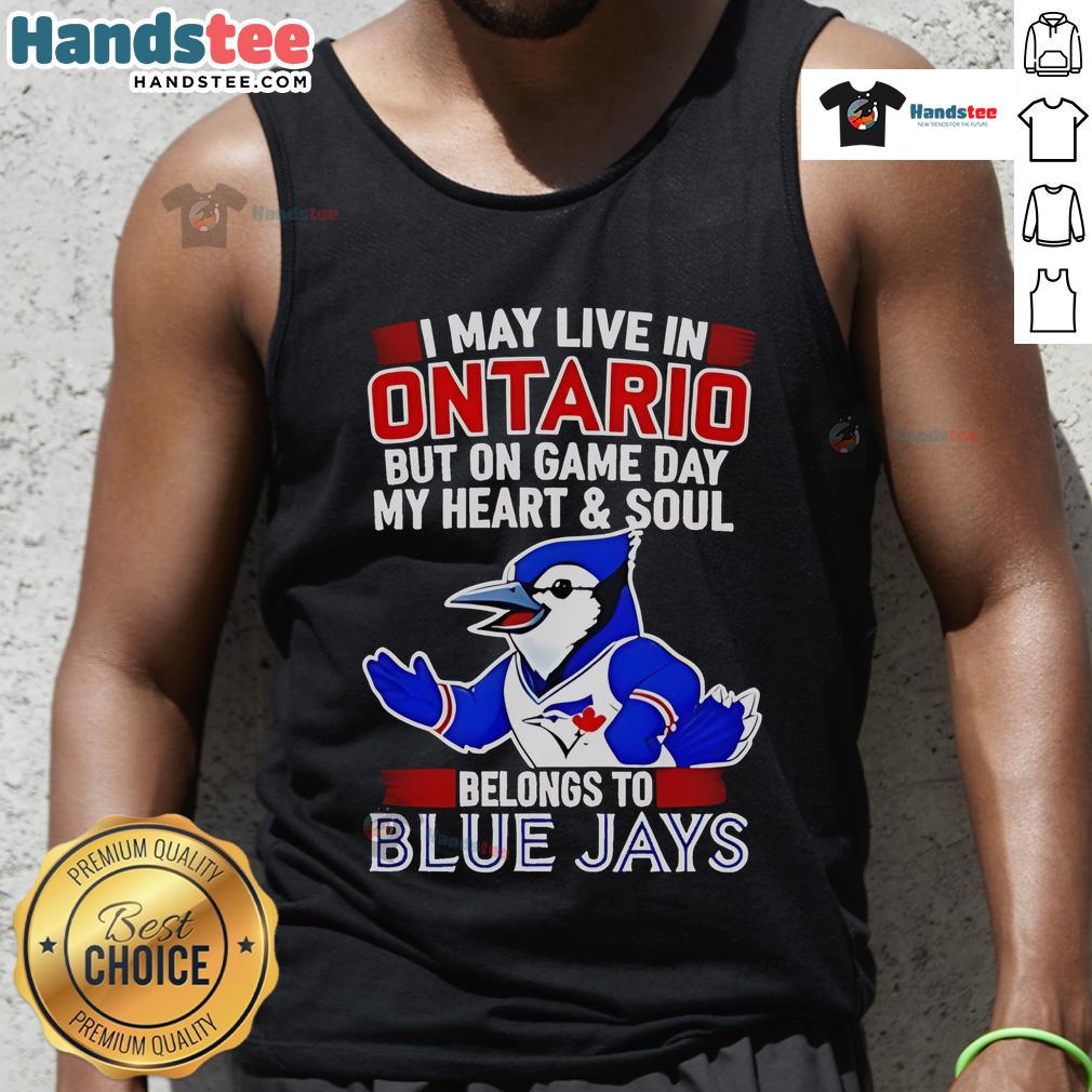 Woman wearing a Toronto Blue Jays tank top showing team spirit, saying 'My heart belongs to the Toronto Blue Jays'.