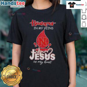 Nice Nebraska Husker in My Veins Jesus in My Heart ladies tee, featuring vibrant team colors and a stylish design.