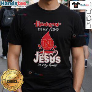 Nice Nebraska Husker In My Veins Jesus In My Heart T-Shirt featuring bold graphics and vibrant colors, perfect for fans.