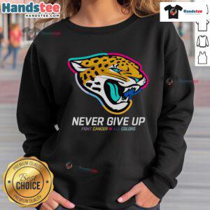 Alt Text: Colorful Jacksonville Jaguars sweatshirt with 'Nice Never Give Up Fight Cancer' design, promoting cancer awareness.