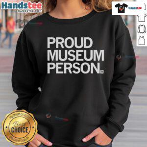 Nice proud museum person wearing a stylish sweatshirt at the museum, showcasing dedication to art and culture.