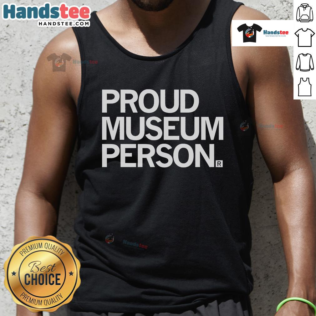 Friendly museum staff member in a tank top proudly showcasing exhibits at a vibrant art museum.