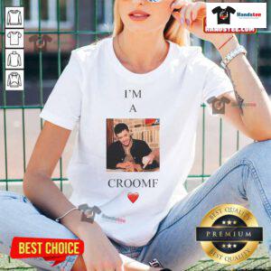 Alt Text: Tom Blyth wearing a stylish 'Im a Croomf' ladies tee, showcasing trendy fashion and a modern look.