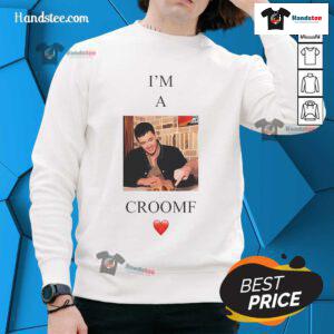 Alt Text: Tom Blyth wearing a stylish 'I'm A Croomf' sweatshirt, showcasing trendy fashion and casual style.