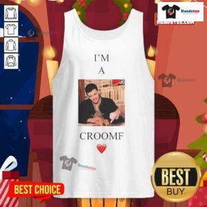 Nice Tom Blyth wearing a stylish Croomf tank top, showcasing modern fashion trends and casual summer style.