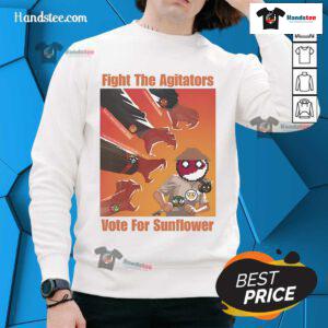 Alt Text: Official Fight the Agitators Vote for Sunflower Sweatshirt featuring vibrant sunflower design and bold slogan.