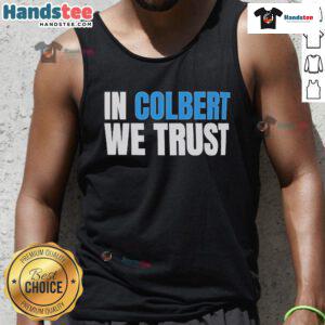 Official 'In Colbert We Trust' tank top featuring bold text design, perfect for fans of Stephen Colbert and stylish summer wear.