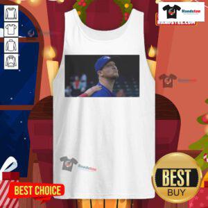 Jeff Hoffman blowing a kiss in a Toronto Blue Jays baseball tank top, showcasing team spirit and sporty style.