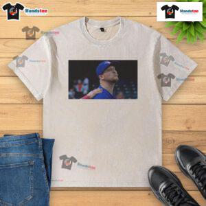 Official Jeff Hoffman blowing a kiss in a Toronto Blue Jays baseball washed t-shirt, showcasing team spirit and style.