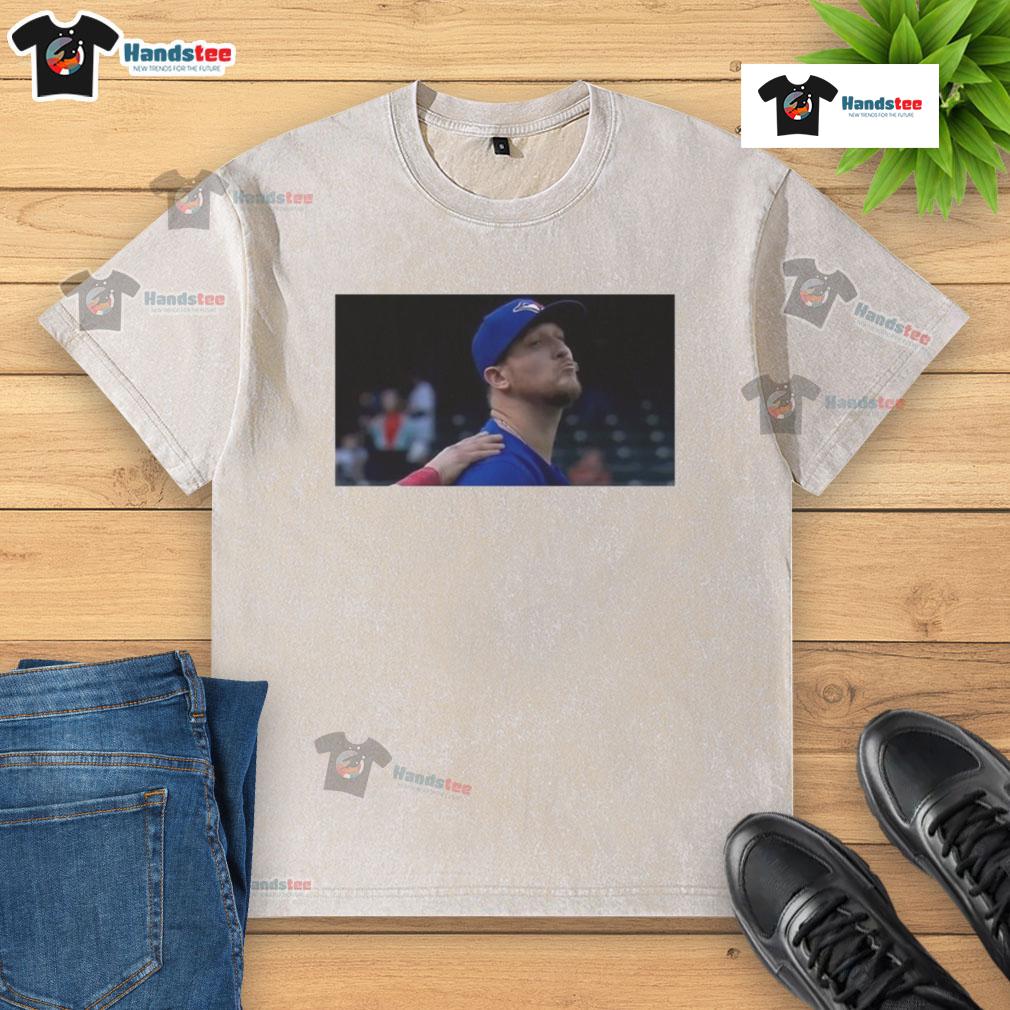 Official Jeff Hoffman blowing a kiss in a Toronto Blue Jays baseball washed t-shirt, showcasing team spirit and style.