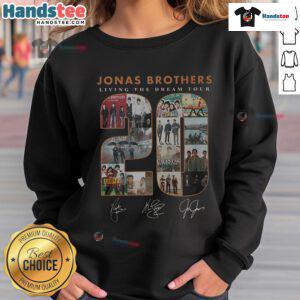 Alt Text: Official Jonas Brothers Living The Dream Signature Sweatshirt featuring bold graphics and a stylish design.