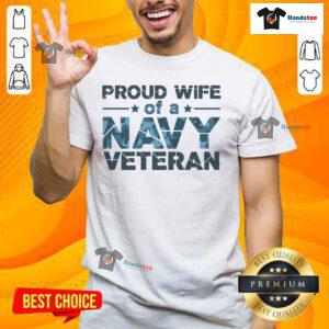 Alt Text: Official Proud Wife Of A Navy Veteran Navy Camo Text T-Shirt featuring bold camo design and patriotic lettering.