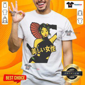 Pretty Japanese urban street girl wearing trendy T-shirt in vibrant city setting, showcasing unique fashion style.