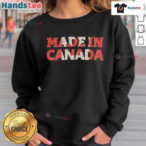 Stylish Made in Canada sweatshirt displayed on a hanger, featuring a cozy design and vibrant colors for casual wear.