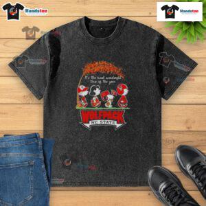 Awesome Peanuts 'It's The Most Wonderful Time Of The Year' NC State Wolfpack washed t-shirt for fans and holiday cheer.