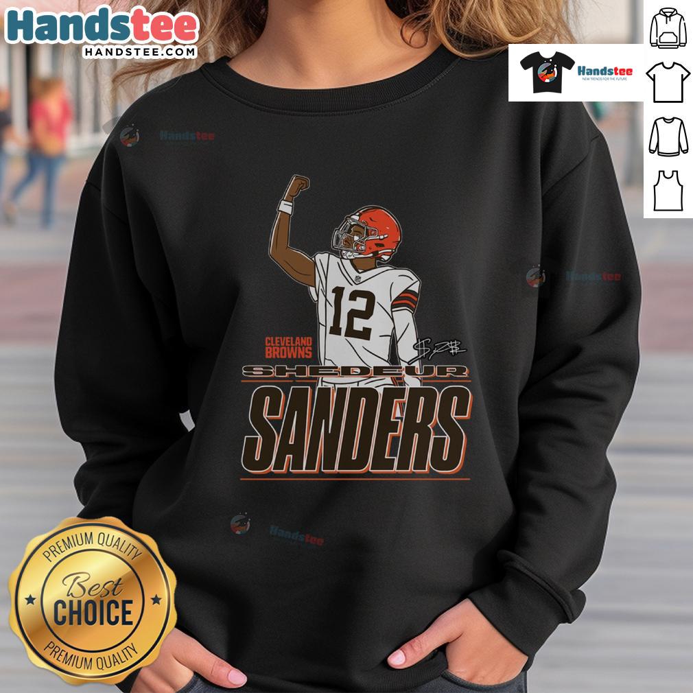 Shedeur Sanders wearing a Cleveland Browns 'Believe' sweatshirt, showcasing team spirit and style.