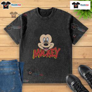 Cute Mickey Mouse icon on a washed t-shirt, perfect for casual wear and Disney fans.
