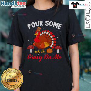 Alt Text: Cute Thanksgiving turkey graphic on a ladies tee with humorous 'Pour Some Gravy On Me' text for holiday fun.