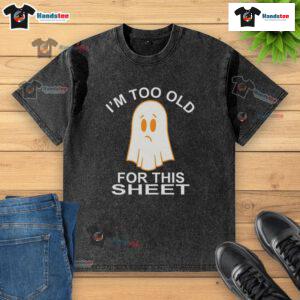 Funny Ghost I'm Too Old For This Sheet T-Shirt featuring a playful ghost graphic on a washed t-shirt design.
