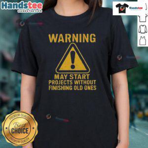 Funny warning tee for ladies: 'May start projects without finishing old ones' - perfect for creative procrastinators.