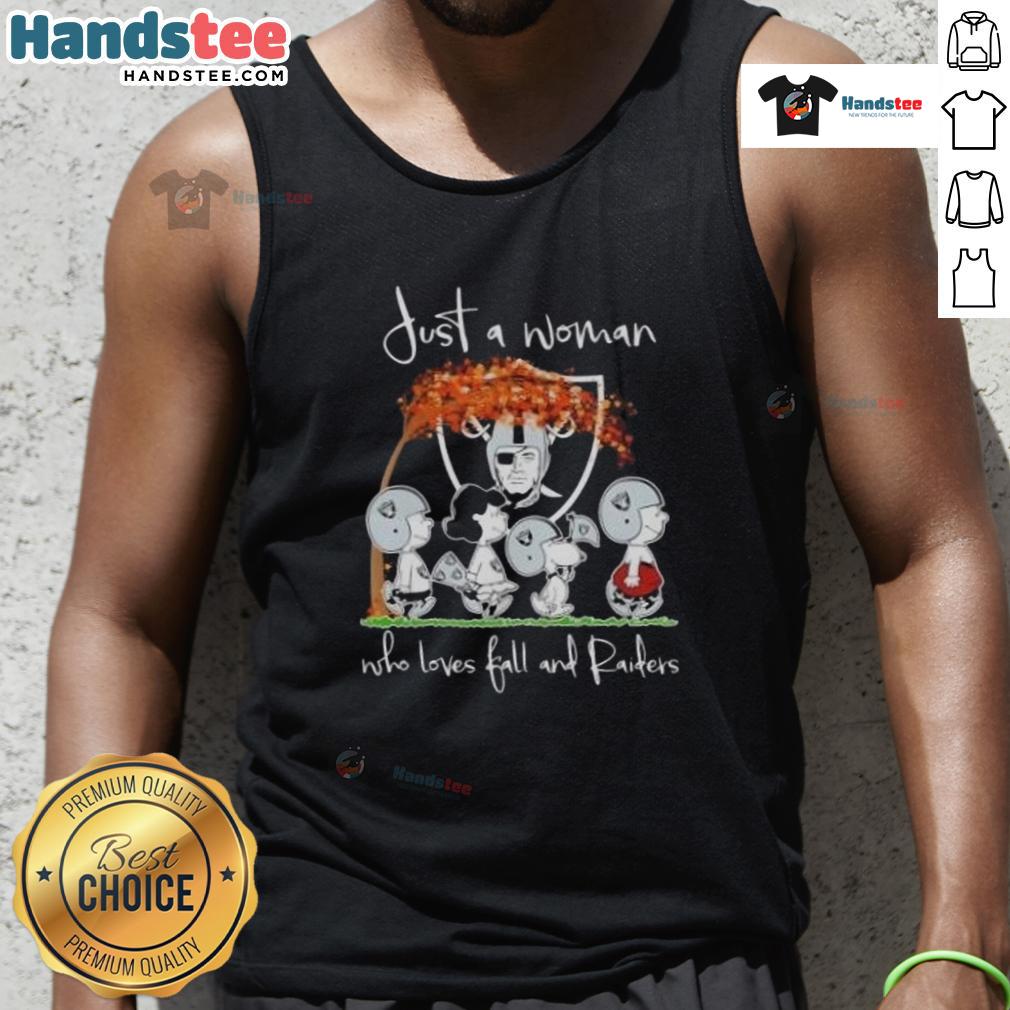 Alt Text: Woman wearing a 'Good Peanuts' Raiders tank top, celebrating fall with a vibrant autumn background.