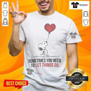 Alt Text: Good Snoopy 'Sometimes You Need To Let Things Go' T-Shirt featuring a playful Snoopy graphic, perfect for casual wear.