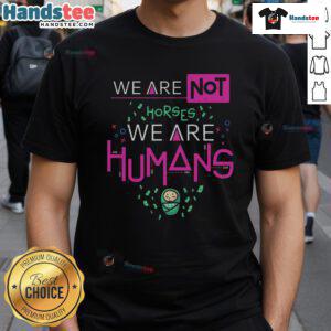 Good We Are Humans T-Shirt featuring a bold graphic design promoting unity and humanity in a stylish casual wear.