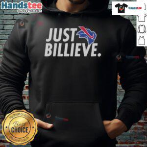 Happy Eric Wood wearing a Just Billieve hoodie, showcasing positivity and style in a vibrant outdoor setting.