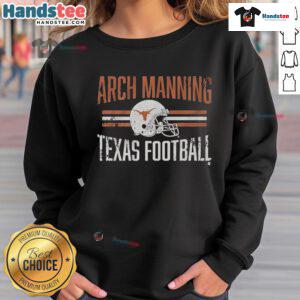 Arch Manning wearing a Texas football sweatshirt, showcasing team spirit and style during a game day.