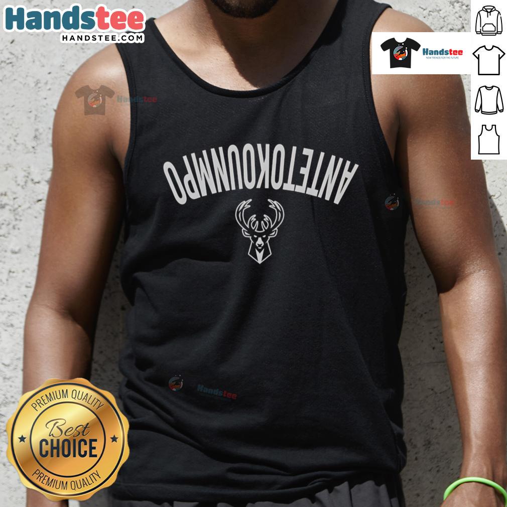 Giannis Antetokounmpo wearing a Milwaukee Bucks Invert Upside tank top, showcasing vibrant team colors and athletic style.