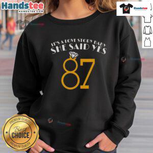 Alt Text: Cozy 'Nice It's A Love Story Baby She Said Yes 87' sweatshirt, perfect for casual outings and expressing love.