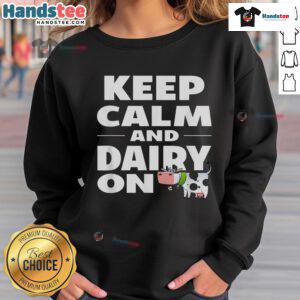 Cozy Nice Keep Calm and Dairy On cow sweatshirt featuring a playful cow graphic on a soft fabric background.