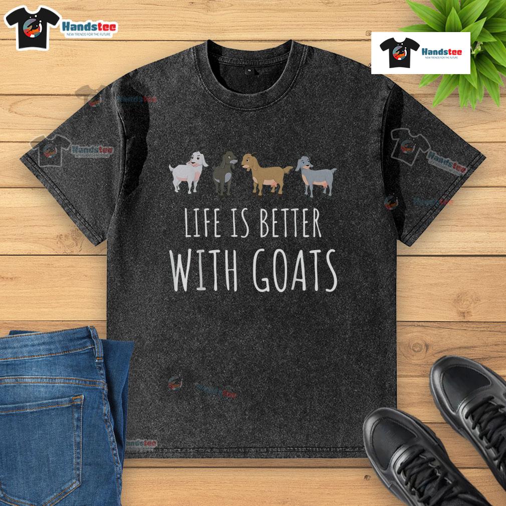 Nice Life is Better with Goats washed t-shirt displayed on a wooden background, showcasing a fun and casual design.