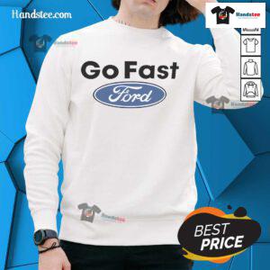 Alt Text: Caitlyn Torres wearing a Go Fast Ford sweatshirt from Nice Motorheads, showcasing stylish automotive fashion.